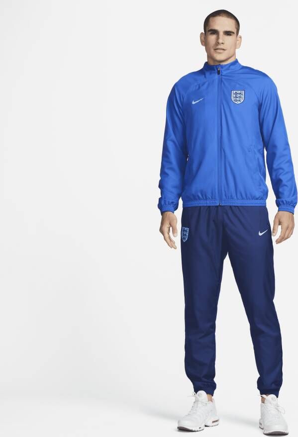 Nike Engeland Strike Dri-FIT geweven voetbaltrainingspak voor heren Blauw