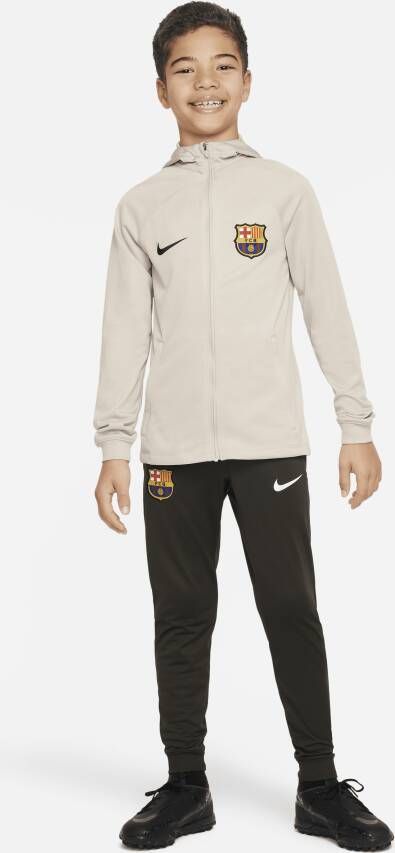Nike FC Barcelona Strike Dri-FIT voetbaltrainingspak met capuchon voor kids Bruin
