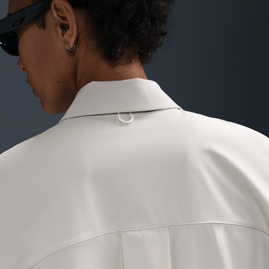 Nike 24.7 PerfectStretch Dri-FIT oversized damestop met lange mouwen Bruin