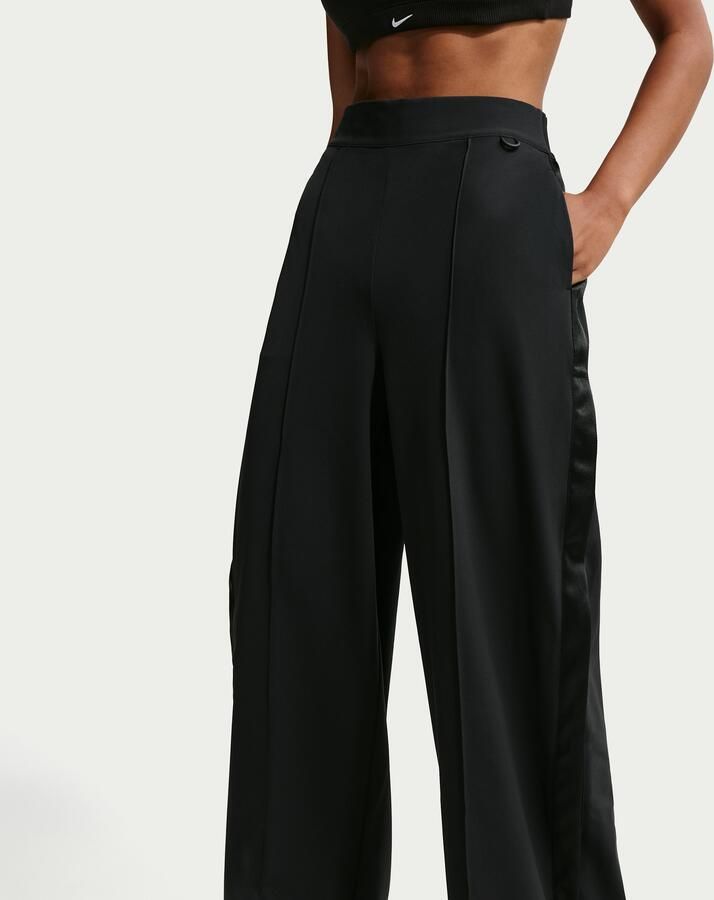 Nike  24.7 PerfectStretch Dri-FIT ruimvallende tearaway-broek met hoge taille voor dames Zwart