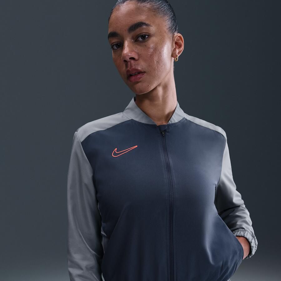 Nike Academy Dri-FIT geweven voetbaltrainingspak voor dames Blauw