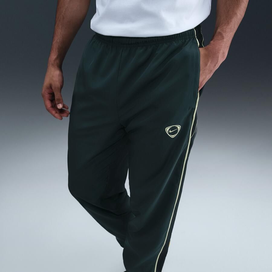 Nike Academy+ Repel geweven voetbalbroek voor heren Groen