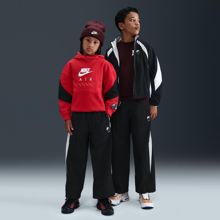 Nike Air geweven trainingsbroek voor kids Zwart - Foto 4