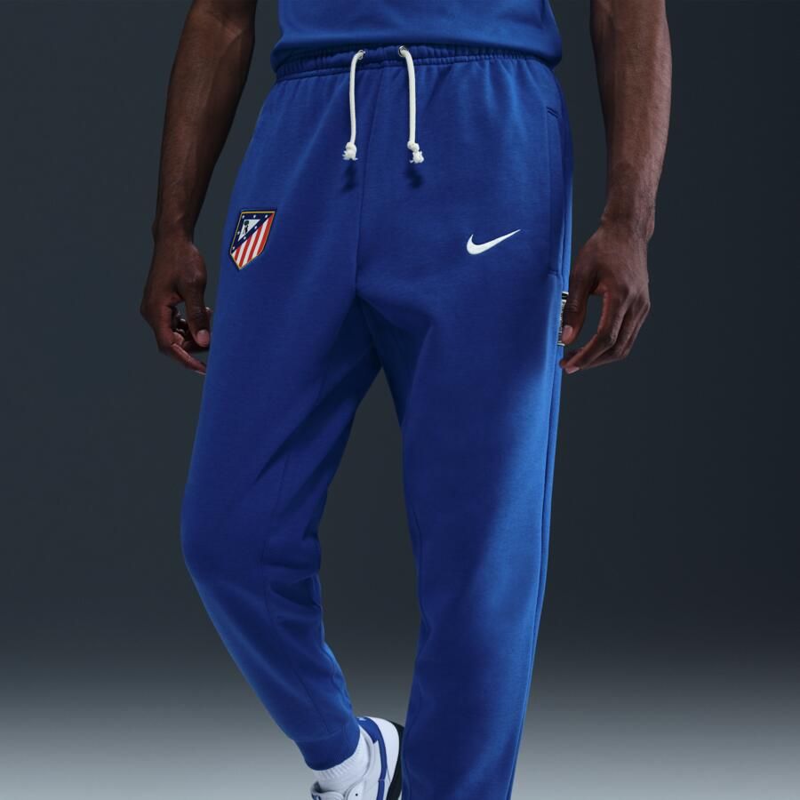 Nike Atlético de Madrid Standard Issue Dri-FIT taps toelopende voetbalbroek voor heren Blauw