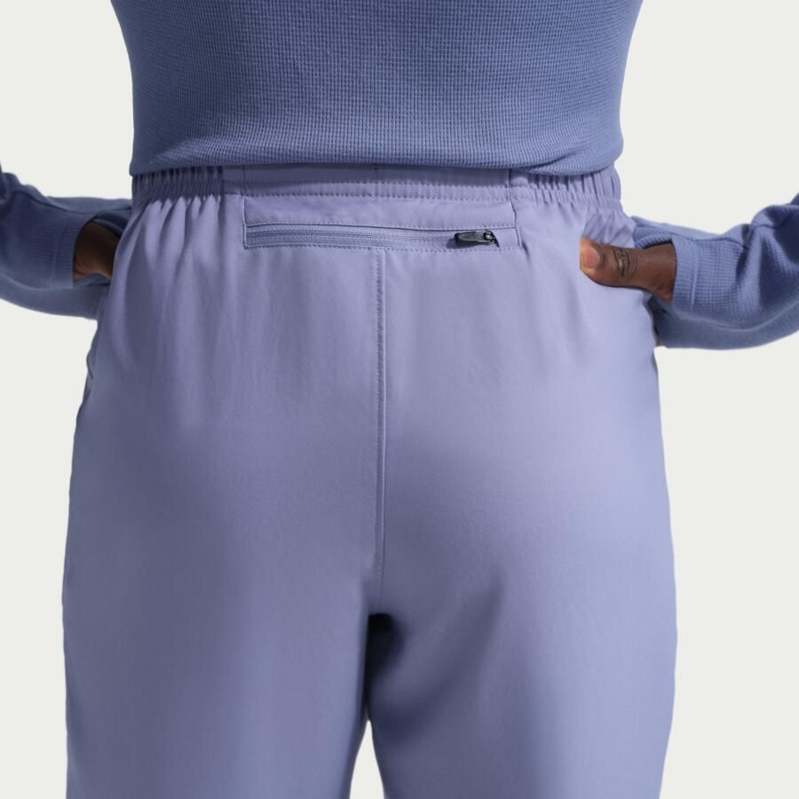 Nike Challenger Dri-FIT geweven hardloopbroek voor heren Paars