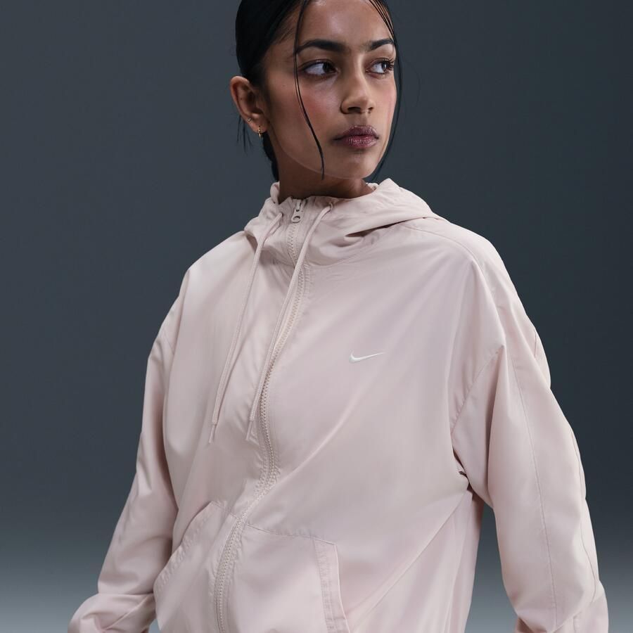 Nike Classic Wovens ruimvallend UV-damesjack met capuchon Roze - Foto 4