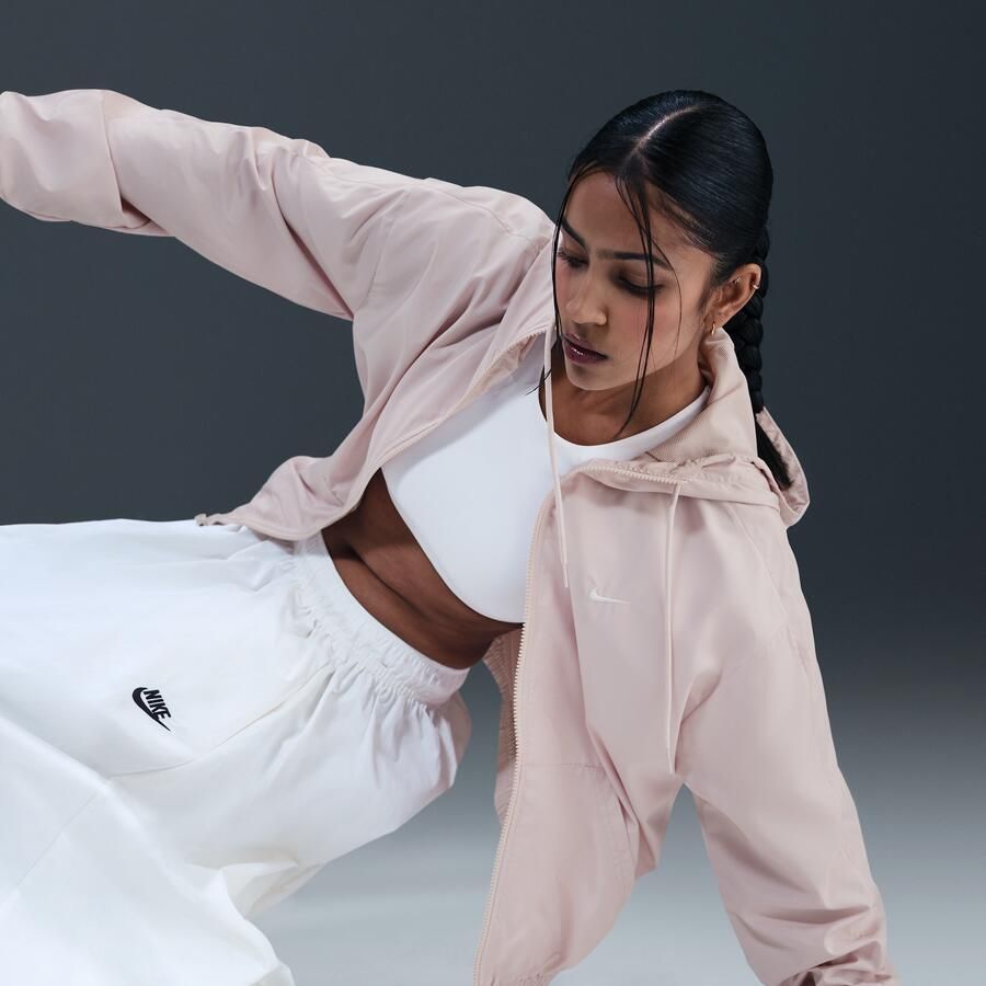 Nike Classic Wovens ruimvallend UV-damesjack met capuchon Roze - Foto 2