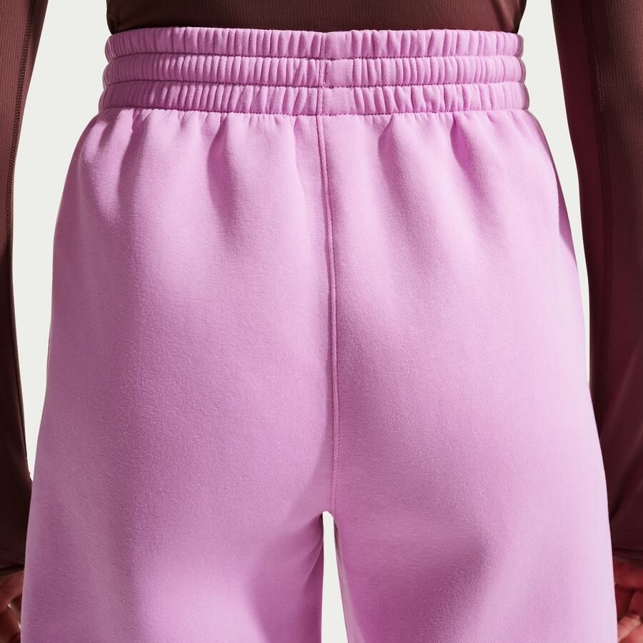 Nike Club Fleece ruimvallende broek met print voor meisjes Paars
