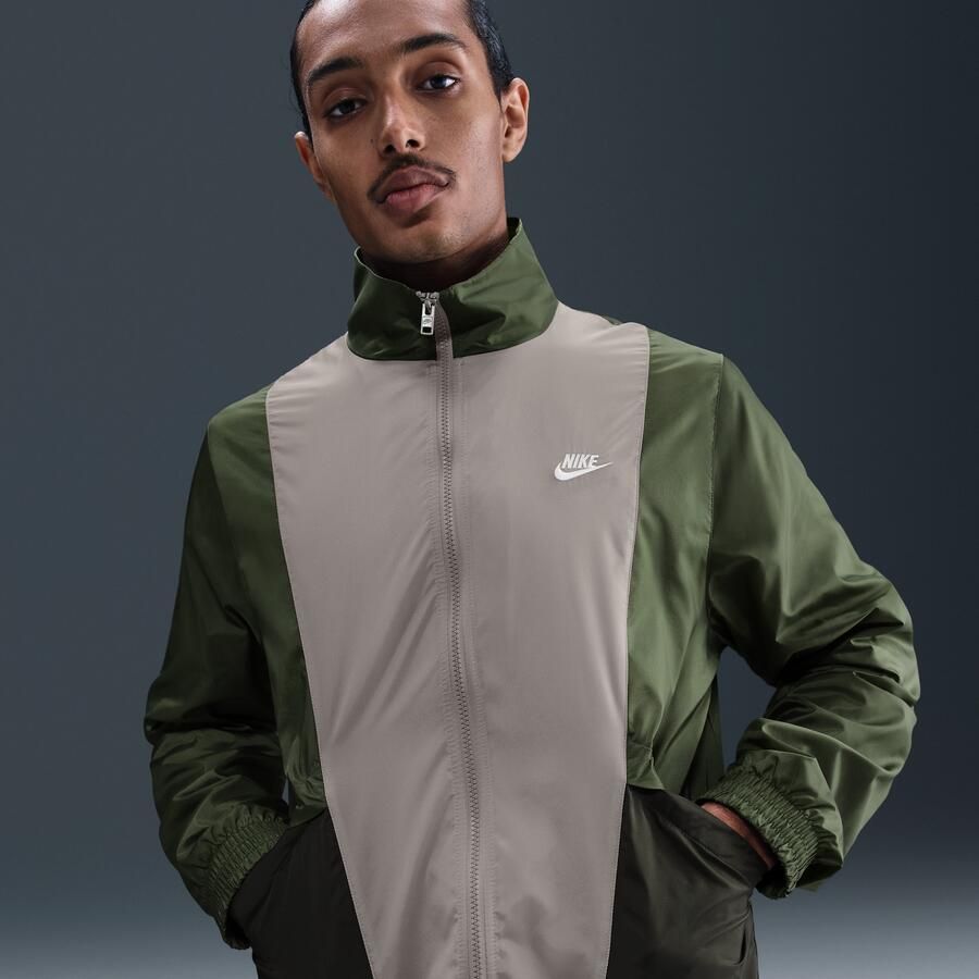 Nike Club geweven trainingspak voor heren Groen