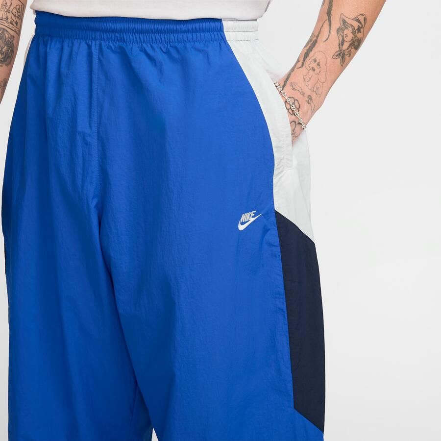 Nike Club oversized geweven trainingsbroek voor heren Blauw