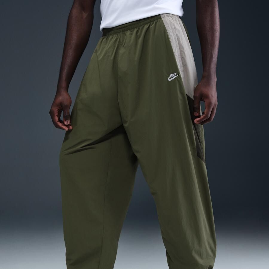 Nike Club oversized geweven trainingsbroek voor heren Groen