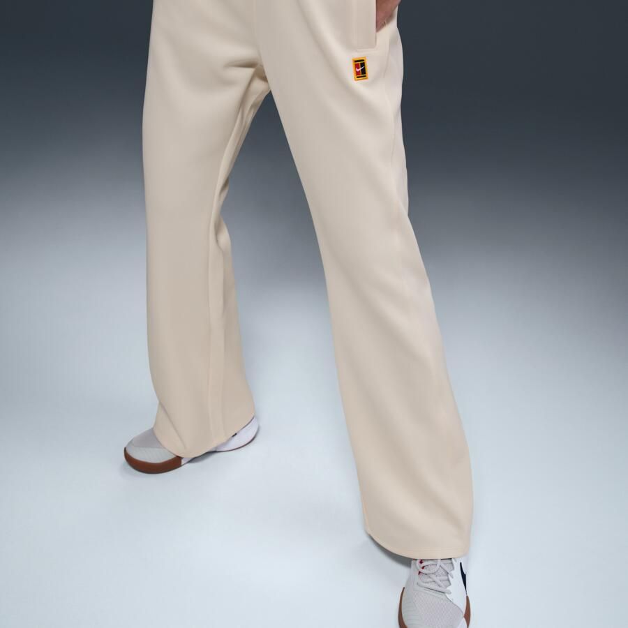 Nike Court Heritage Windrunner tennisbroek met halfhoge taille voor dames Bruin