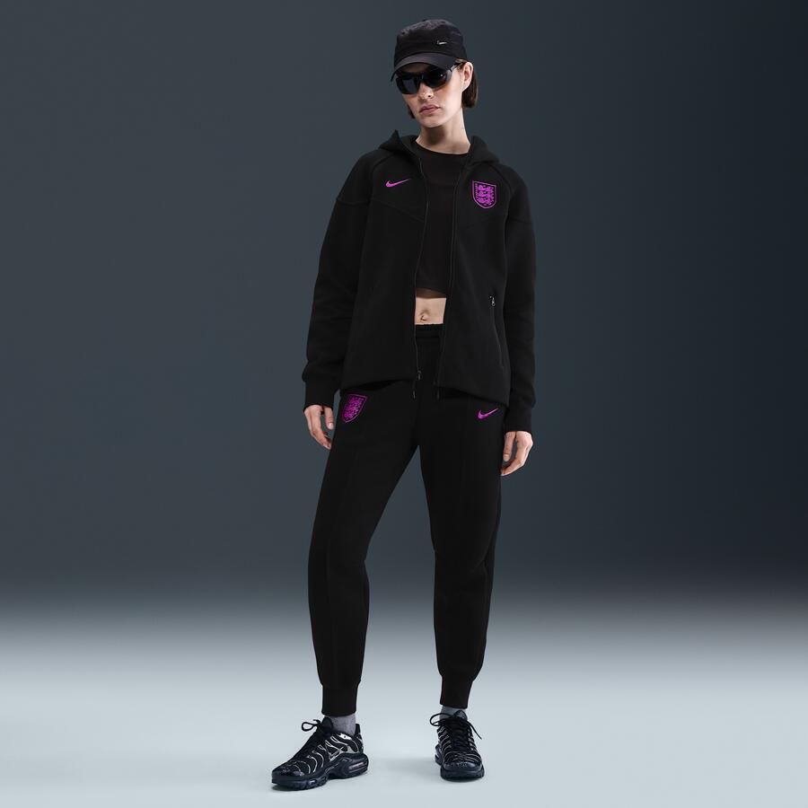 Nike Engeland Tech voetbaljoggingbroek van fleece met halfhoge taille voor dames Zwart - Foto 4