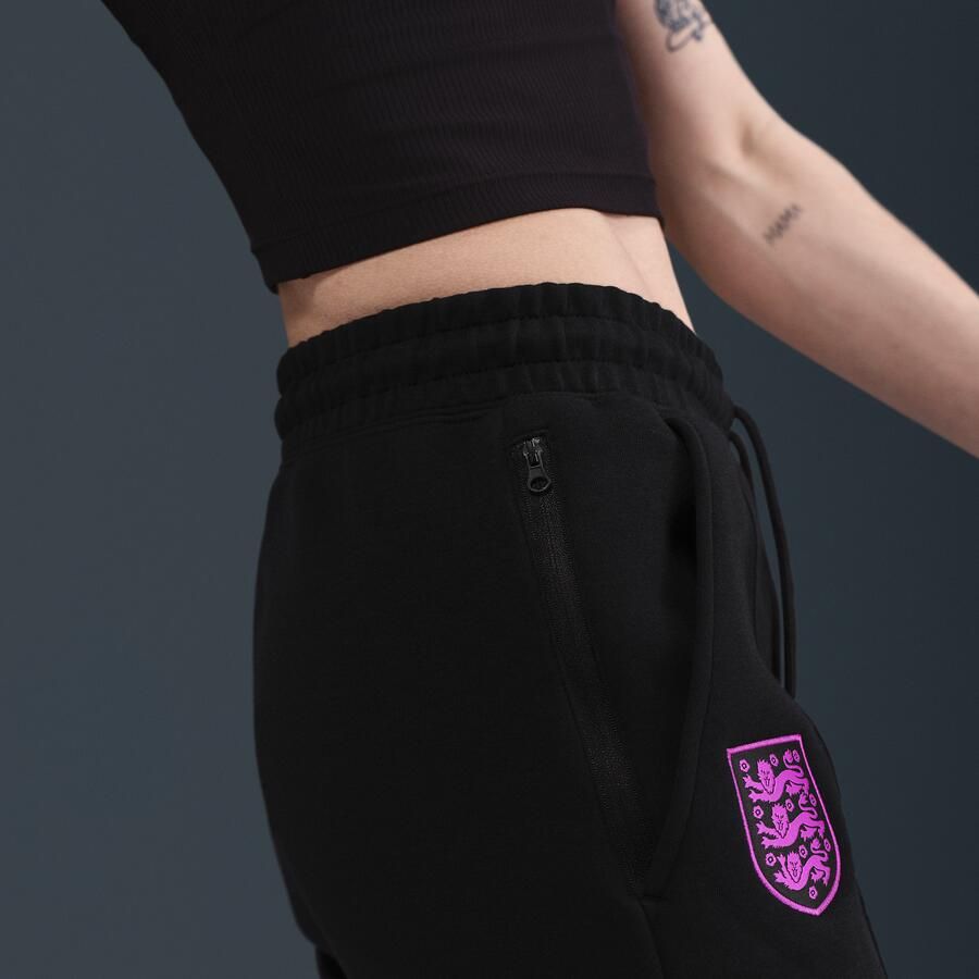 Nike Engeland Tech voetbaljoggingbroek van fleece met halfhoge taille voor dames Zwart - Foto 2