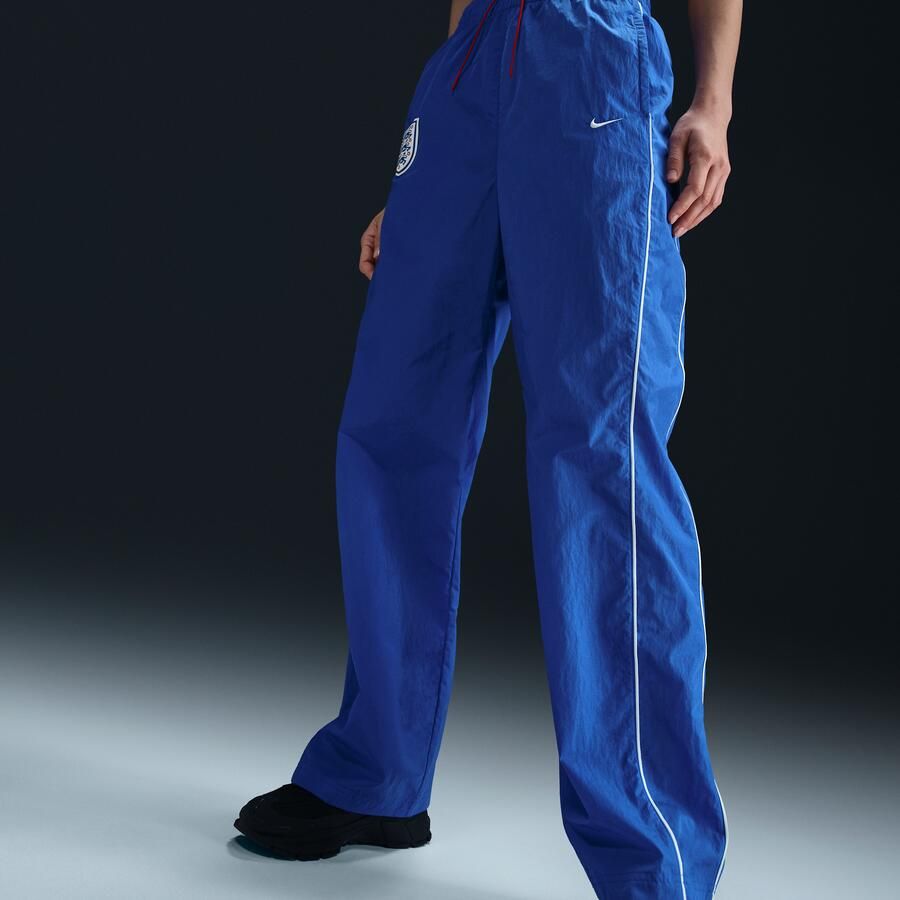 Nike Engeland Windrunner geweven voetbalbroek met hoge taille voor dames Blauw