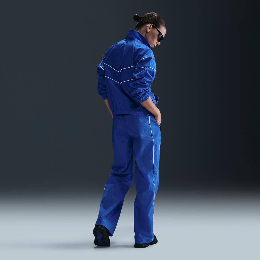 Nike Engeland Windrunner geweven voetbalbroek met hoge taille voor dames Blauw - Foto 3