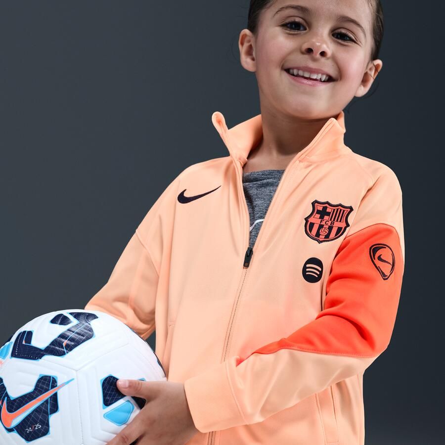 Nike FC Barcelona Strike Derde Dri-FIT Total 90 knit voetbaltrainingspak voor kleuters Oranje
