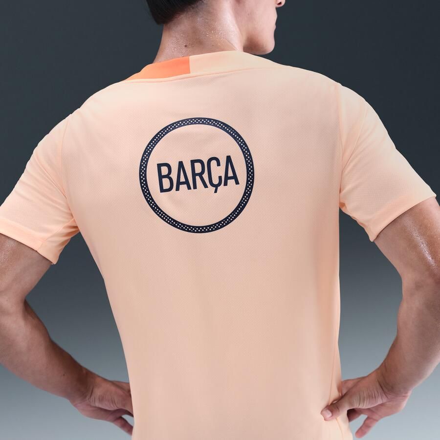 Nike FC Barcelona Strike Derde Total 90 knit voetbaltop met Dri-FIT voor heren Oranje