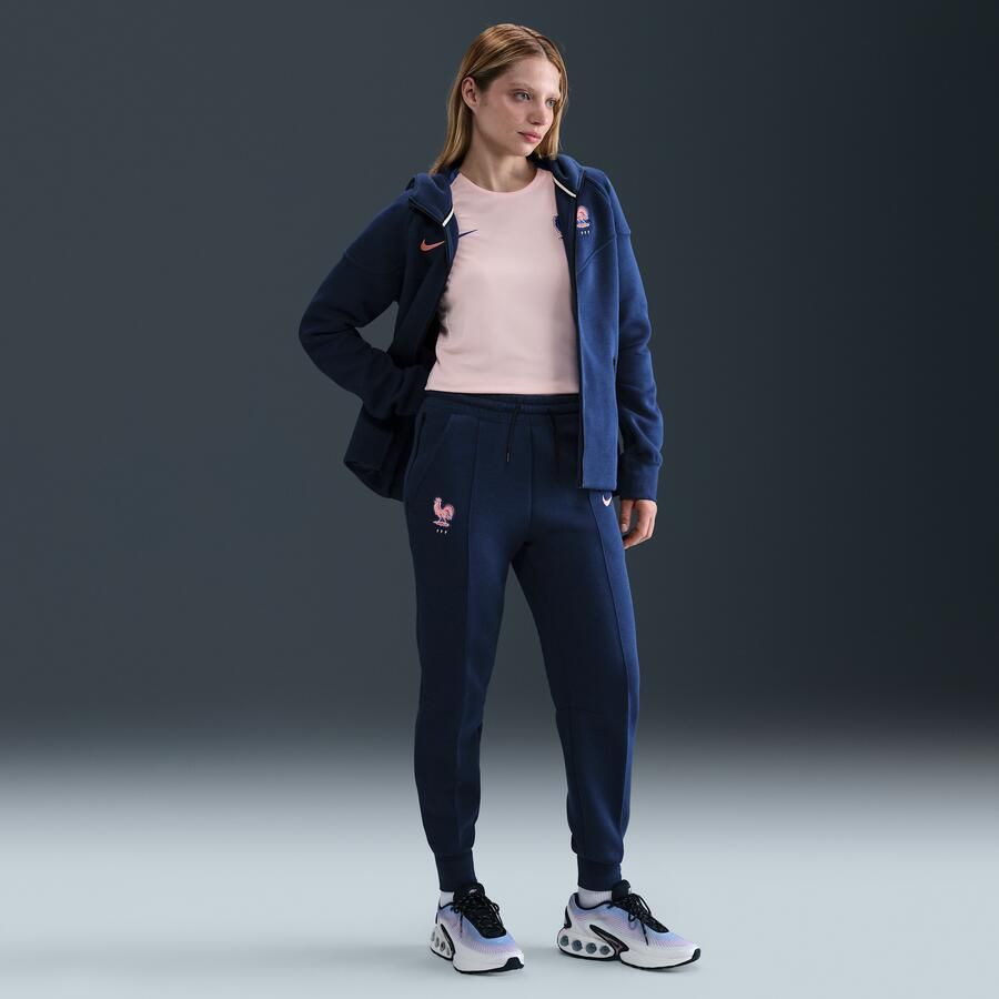 Nike FFF Tech voetbaljoggingbroek van fleece met halfhoge taille voor dames Blauw - Foto 4