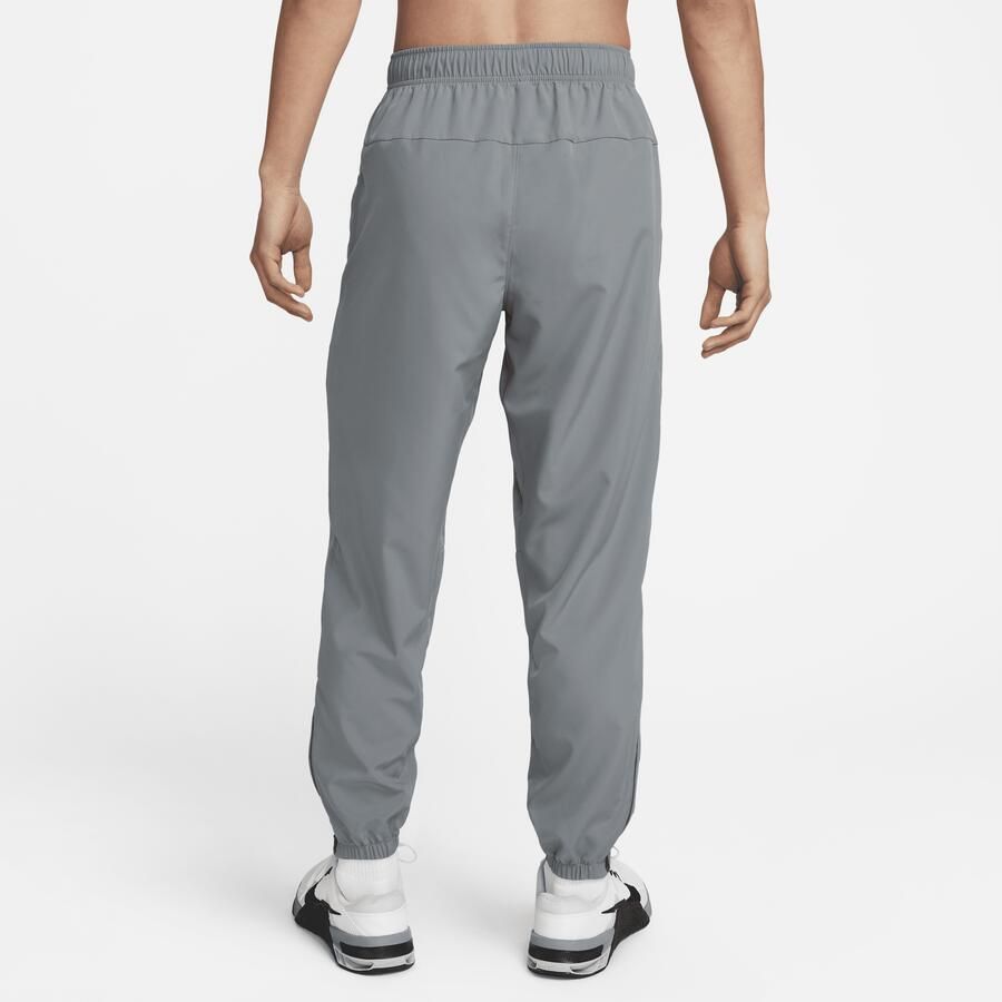 Nike Form Dri-FIT toelopende multifunctionele herenbroek Grijs