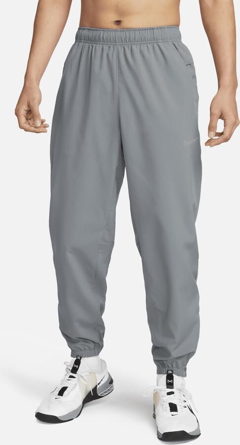 Nike Form Dri-FIT toelopende multifunctionele herenbroek Grijs - Foto 4