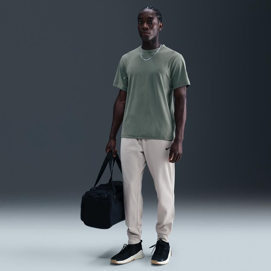 Nike Hyverse Dri-FIT UV multifunctionele herentop met korte mouwen Grijs - Foto 4