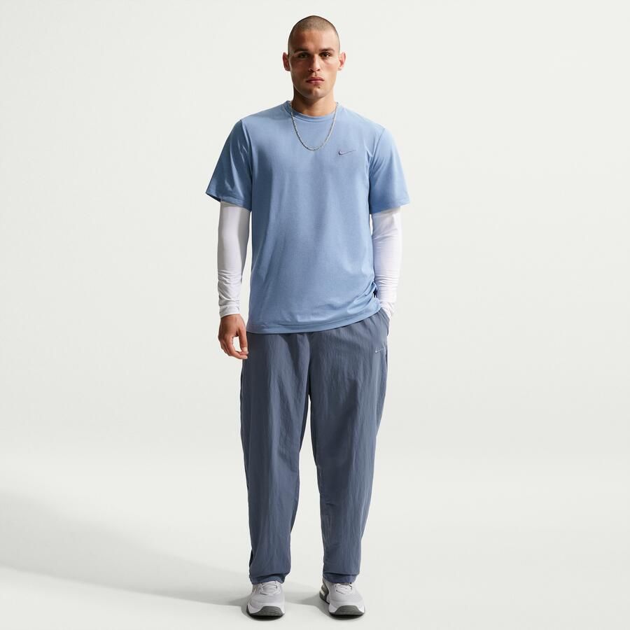 Nike N.A.C. Dri-FIT geweven trainingsbroek voor heren Blauw - Foto 4