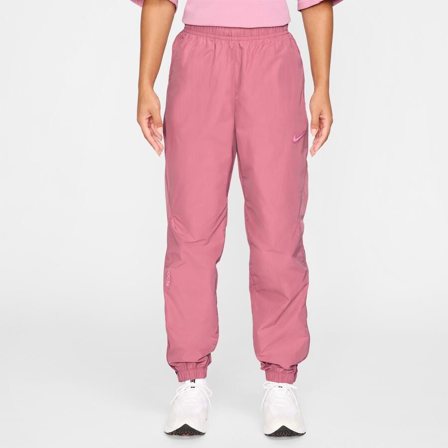 Nike NOCTA Northstar nylon trainingsbroek Roze