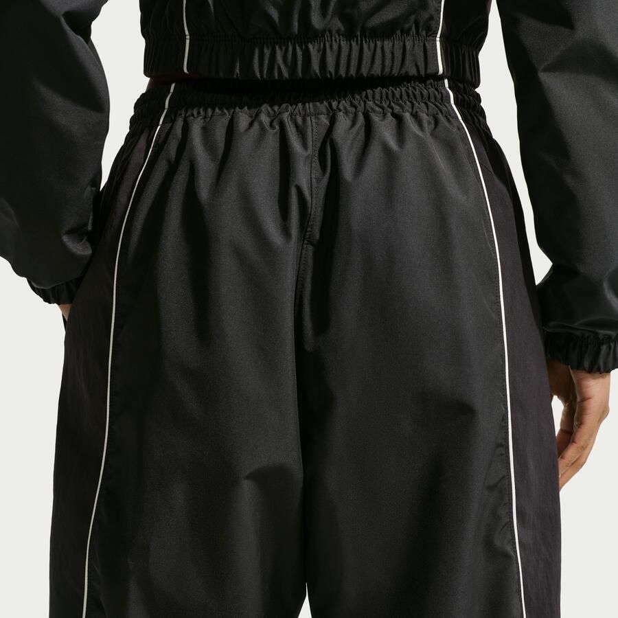 Nike Oversized trainingsbroek met middelhoge taille voor dames Zwart