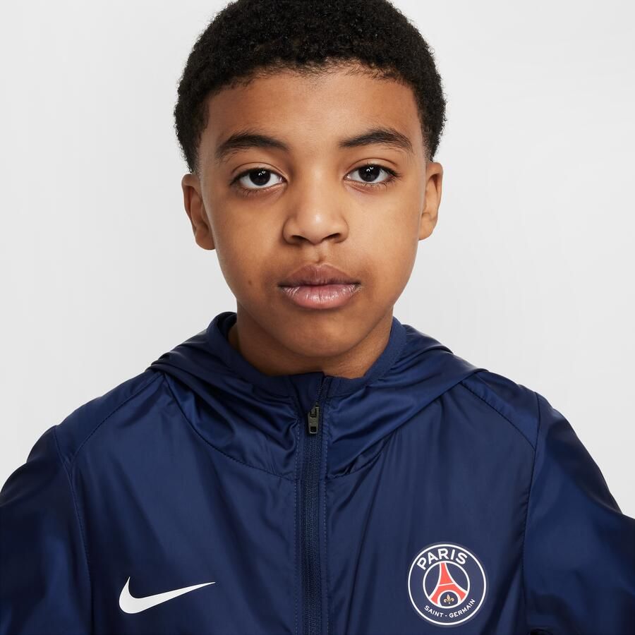 Nike Paris Saint-Germain Academy Pro voetbalregenjack met capuchon voor kids Blauw