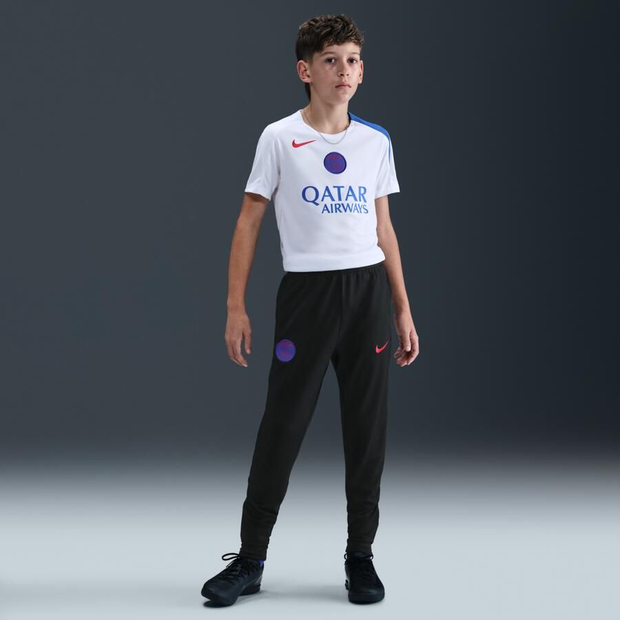 Nike Paris Saint-Germain Strike Derde Total 90 knit voetbalbroek met Dri-FIT voor kids Zwart - Foto 4