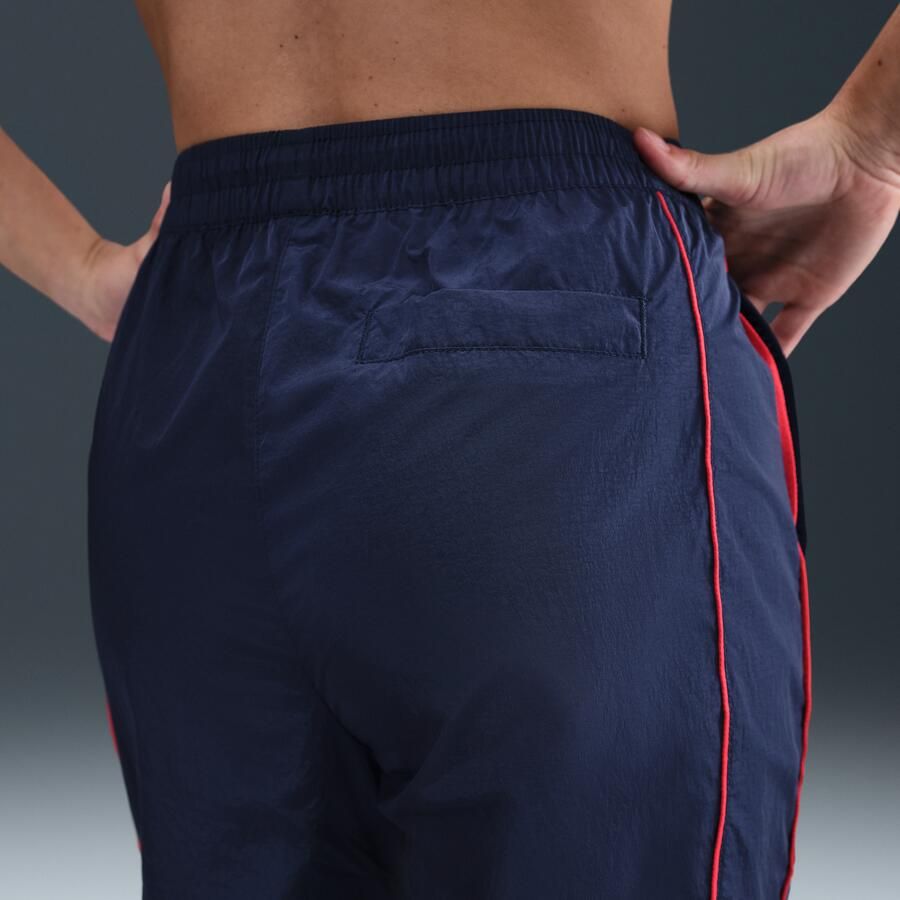 Nike Paris Saint-Germain Windrunner geweven voetbalbroek met hoge taille en open zoom voor dames Blauw - Foto 2