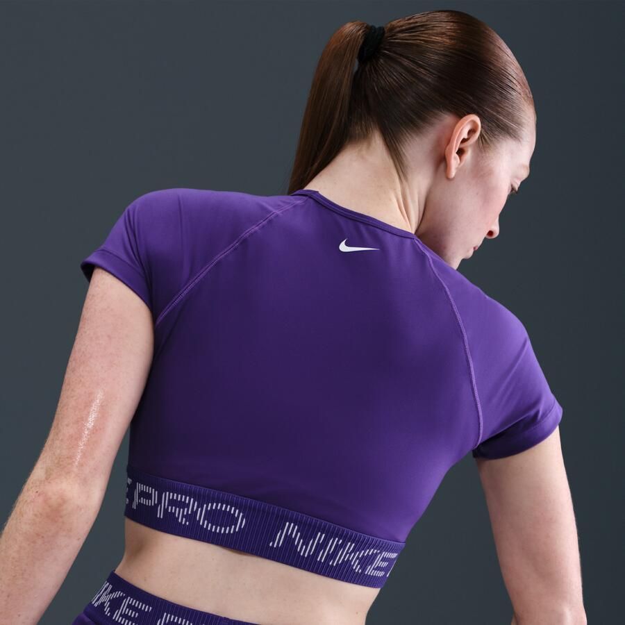 Nike Pro Dri-FIT korte damestop met korte mouwen en graphic Paars