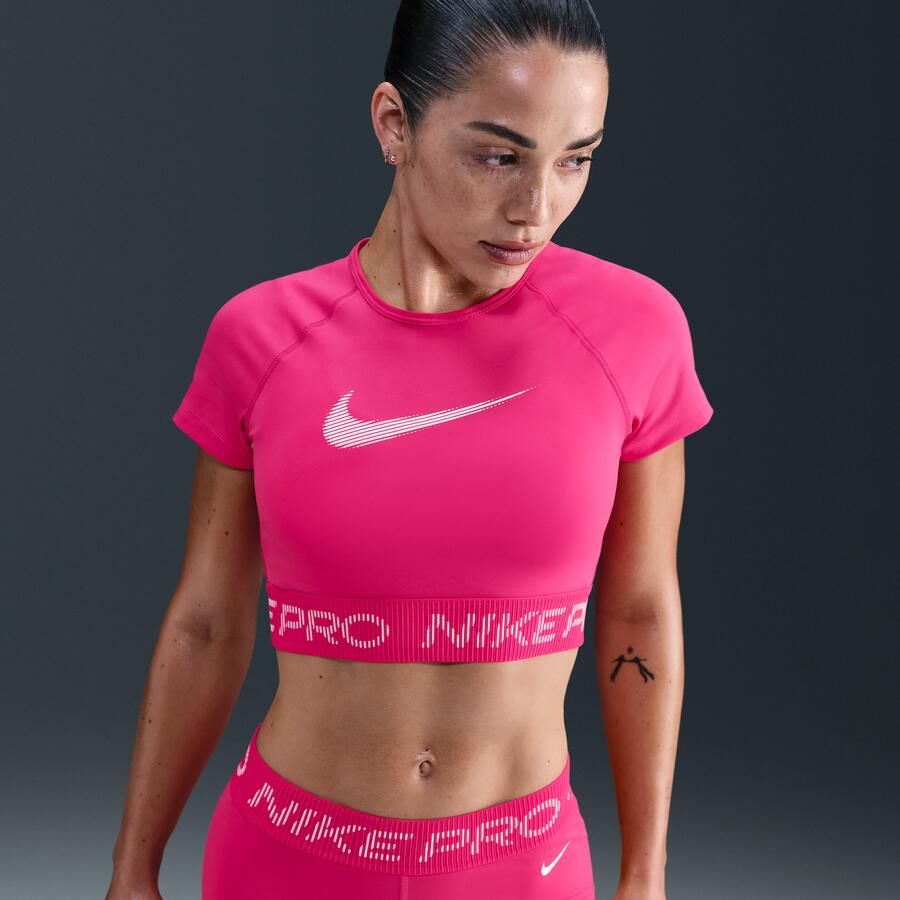 Nike Pro Dri-FIT korte damestop met korte mouwen en graphic Roze - Foto 4