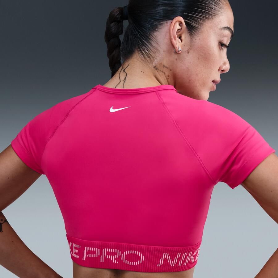 Nike Pro Dri-FIT korte damestop met korte mouwen en graphic Roze
