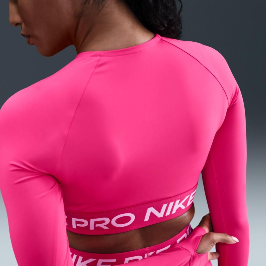 Nike Pro Dri-FIT korte top met lange mouwen voor dames Roze