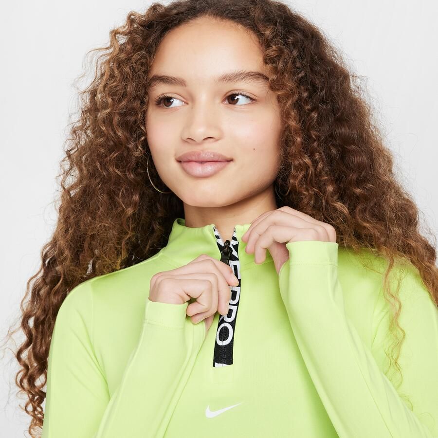 Nike Pro Dri-FIT meisjestop met lange mouwen en halflange rits Geel