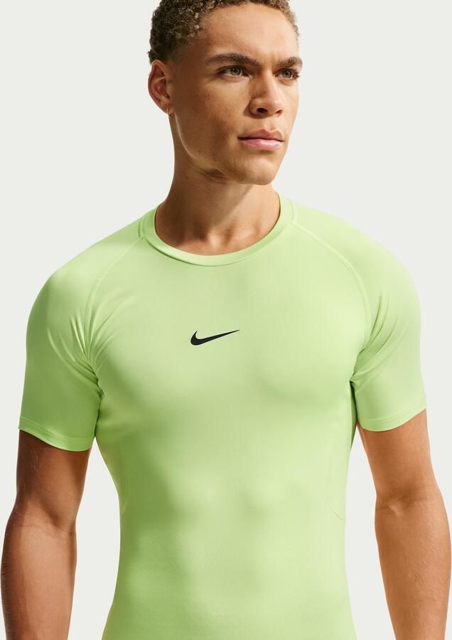 Nike Pro Dri-FIT strakke fitnesstop met korte mouwen voor heren Groen - Foto 4