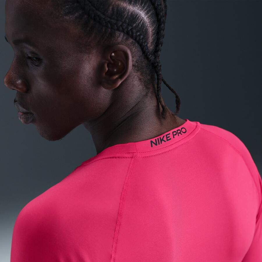 Nike Pro Dri-FIT strakke fitnesstop met korte mouwen voor heren Roze