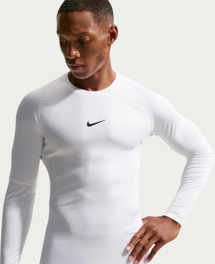 Nike Pro Dri-FIT strakke fitnesstop met lange mouwen voor heren Wit