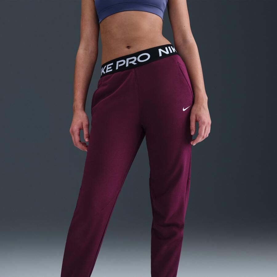 Nike Pro Fleece Dri-FIT joggingbroek voor meisjes Rood