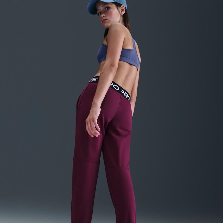 Nike Pro Fleece Dri-FIT joggingbroek voor meisjes Rood - Foto 2