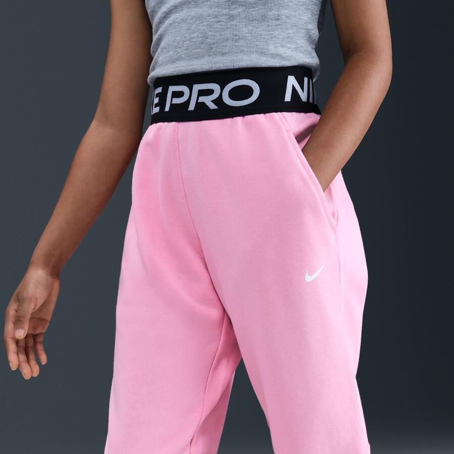 Nike Pro Fleece Dri-FIT joggingbroek voor meisjes Roze