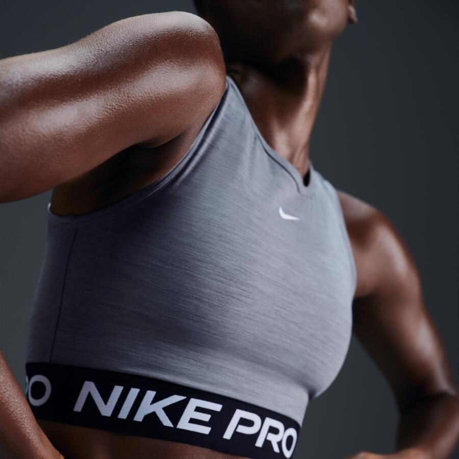 Nike Pro korte tanktop met Dri-FIT voor dames Grijs