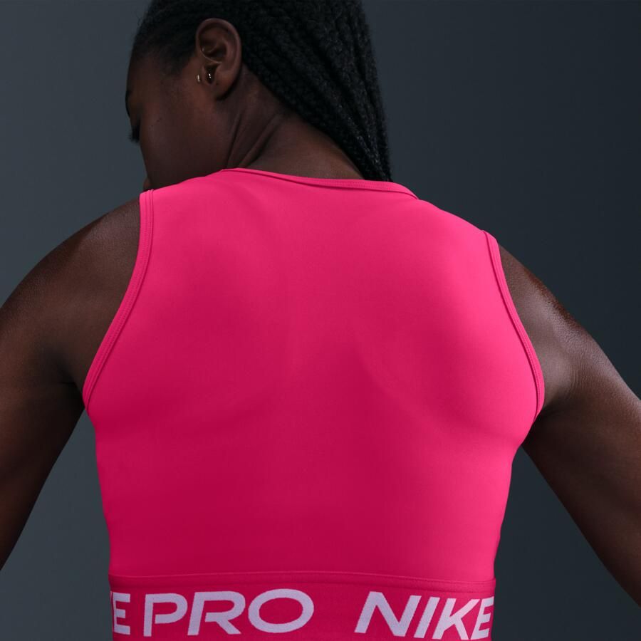 Nike Pro korte tanktop met Dri-FIT voor dames Roze