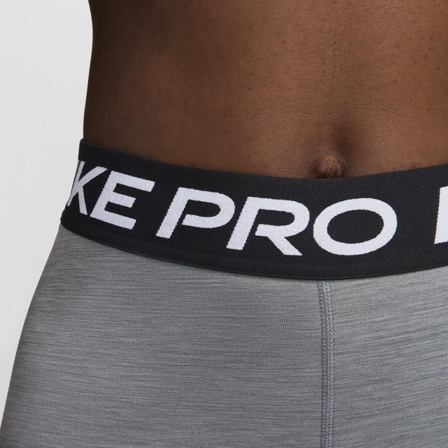 Nike Pro Legging met halfhoge taille en mesh vlakken voor dames Grijs