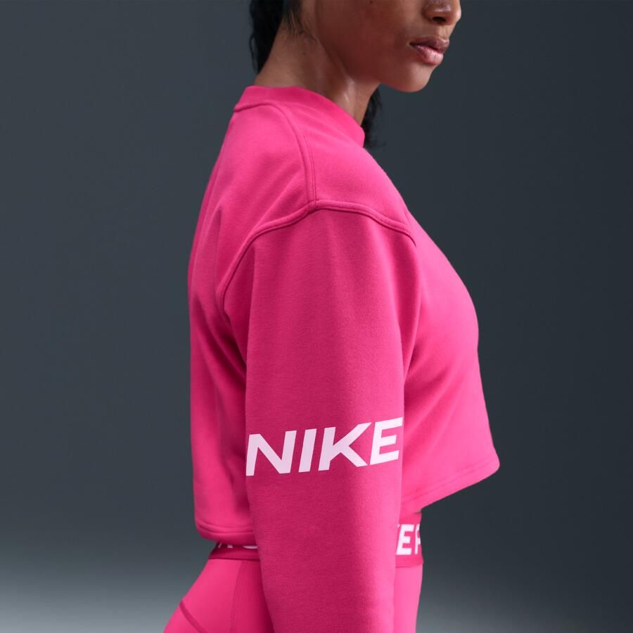 Nike Pro ruimvallend Dri-FIT sweatshirt met ronde hals van sweatstof Roze