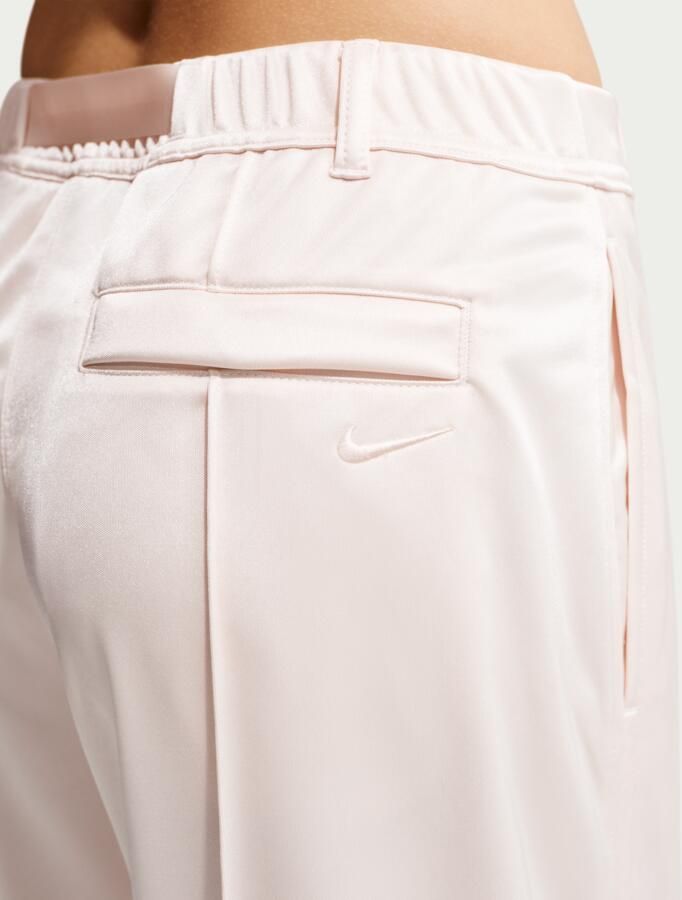 Nike ruimvallende plooibroek met riem en halfhoge taille voor dames Wit