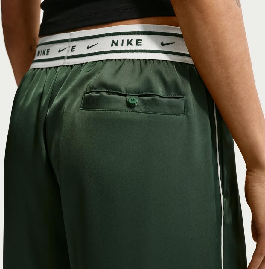 Nike ruimvallende satijnen damesbroek met halfhoge taille Groen