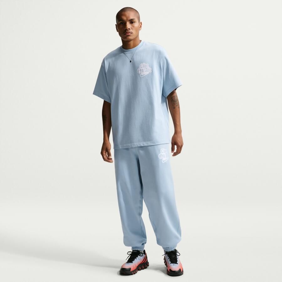 Nike Solo Swoosh fleecebroek met boorden voor heren Blauw - Foto 4